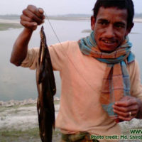 A fisherman showing his catch